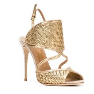 Salvatore Ferragamo
Gold toned leather sandals